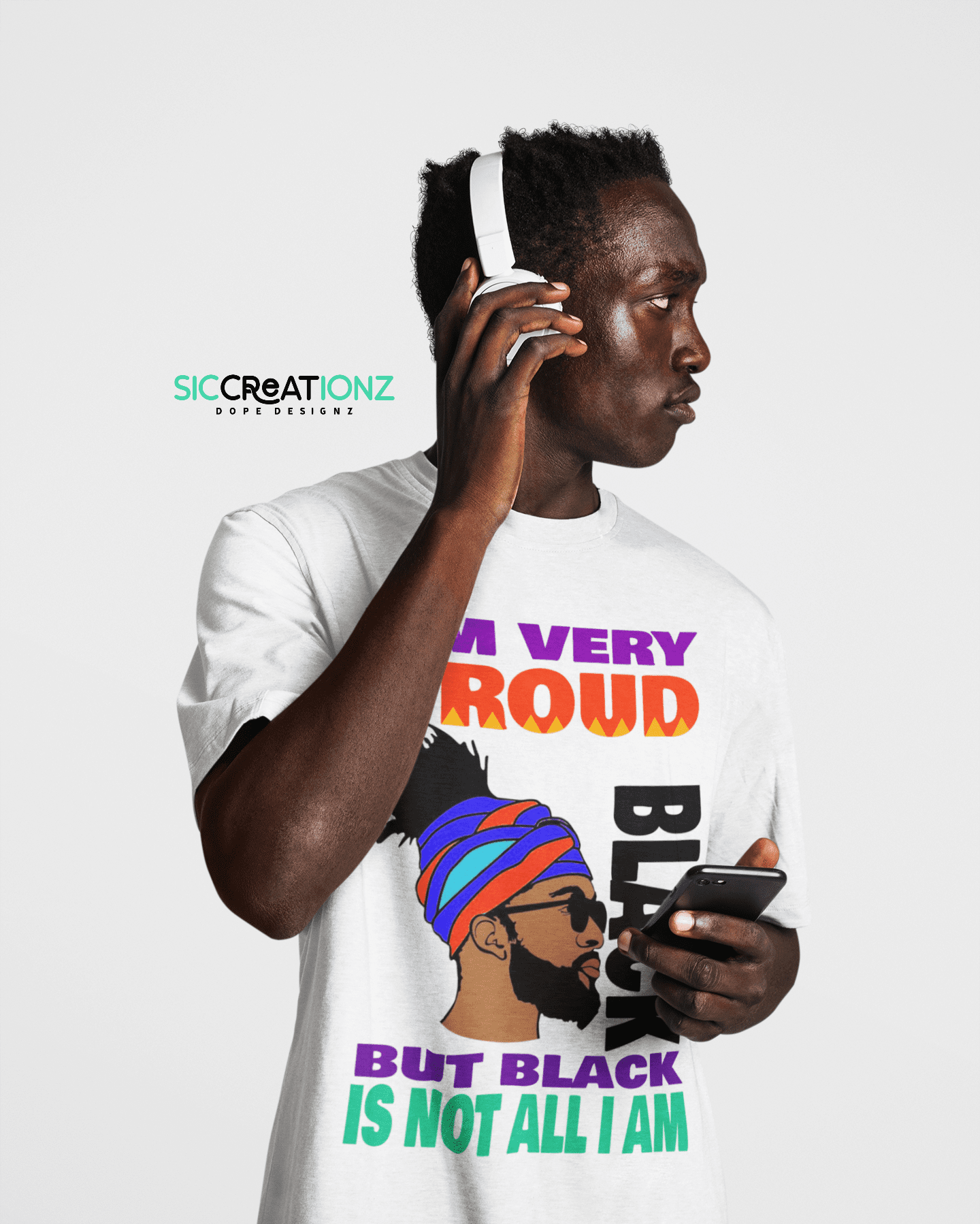 #ProudBlackTee #BlackPrideFashion #EmpowermentWear #ProudlyBlackShirt #CelebrateBlacknessTee #HeritageInStyle #BlackCulturePride #IdentityStatementTee #StrongAndProudShirt,100% Cotton,Bella & Canvas,Men's T-shits,T-shirt,White T-shirt
